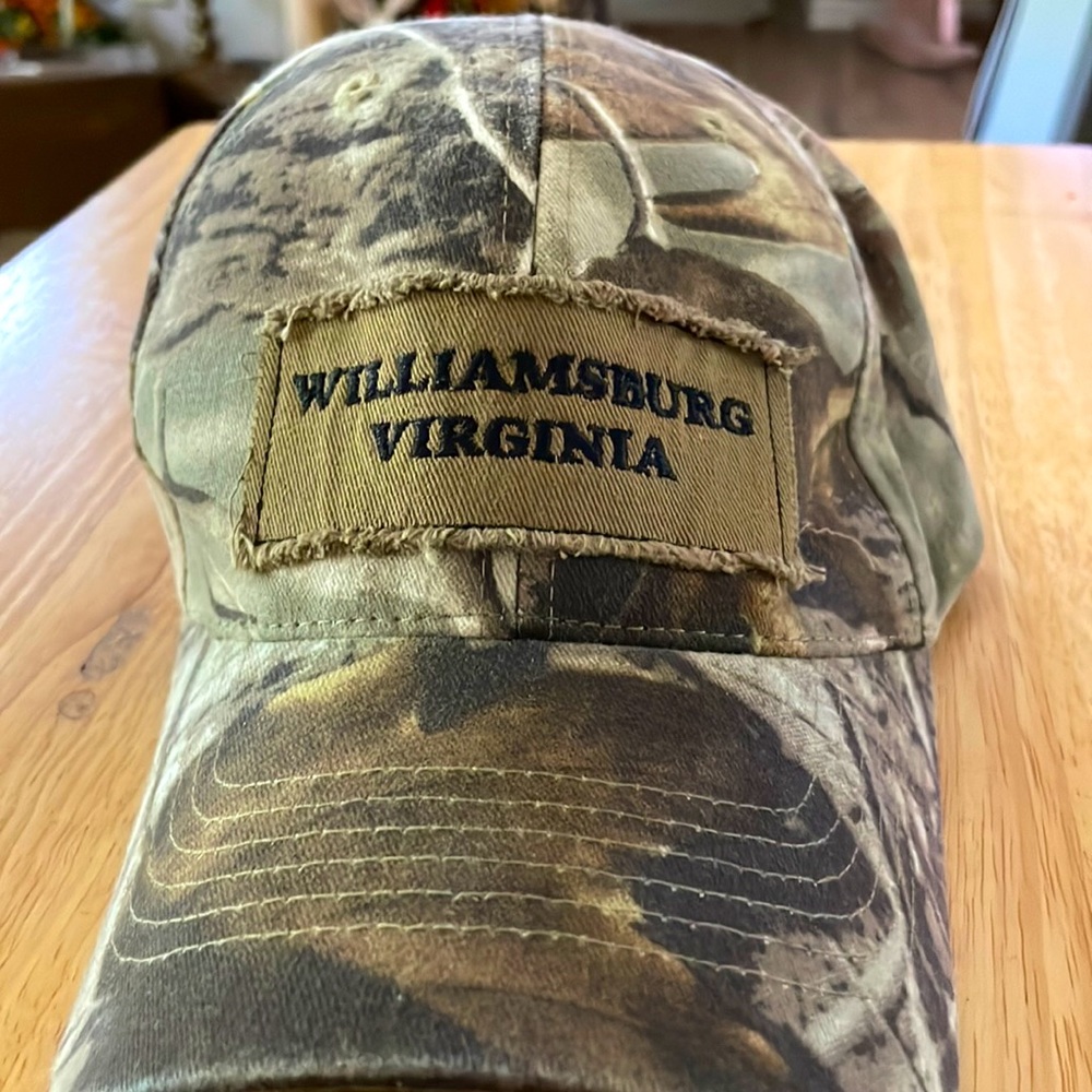 Camouflage, hat or lid one-size-fits-all, made by J hat, good winter lid